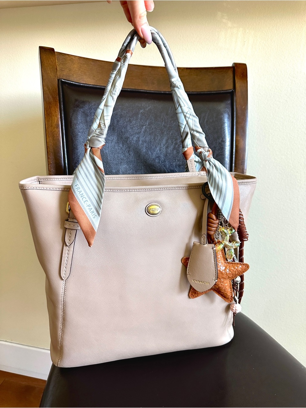 Coach Saffiano Leather Beige Tote with Scarf-Wrapped Handles and a Star Charm